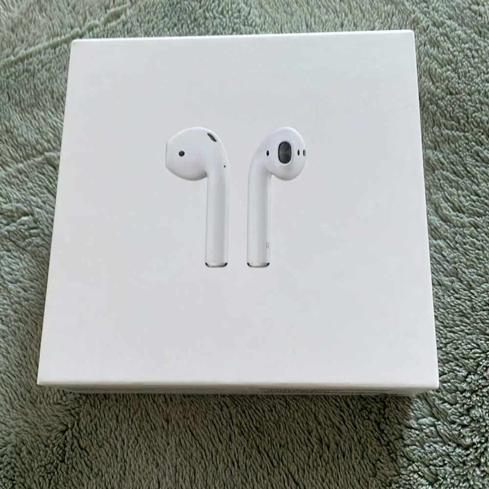 Used AirPods with brand new charger
